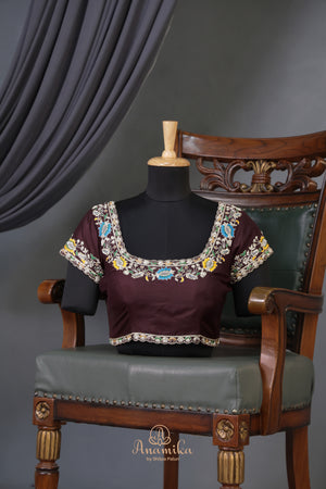 Timeless Ikkat patola elegance in rich chocolate brown