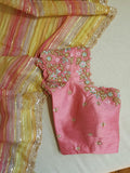 Multi colored pink hued Georgette saree with sequins border