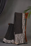 A graceful black Georgette saree with stylish full sleeves blouse