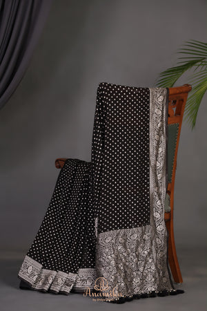 A graceful black Georgette saree with stylish full sleeves blouse