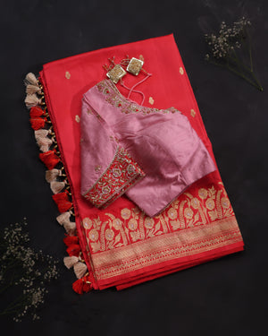 Raw Mango saree in red paired with a pink blouse