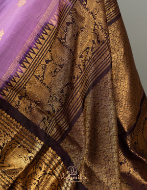 Lavender Gadwal Saree with a contrast coffee color border