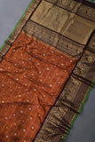Rich kanjeevaram saree in rust orange and brown border