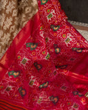 Twill Patola saree in a lovely shade of light brown and red