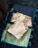 Timeless Gadwal Pattu saree in deep navy and teal blue