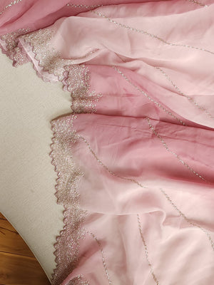 Shaded pink Georgette saree with work border