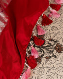 Pink Banarasi kora with a beautiful contrast red meenakari floral border