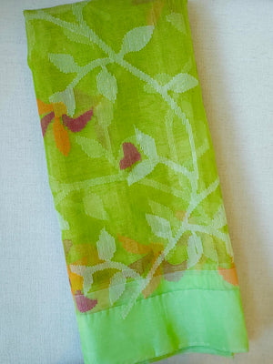 Lime Green Muslin Jamdaani saree with a peach pink crush tissue work blouse