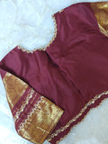 A stunning vintage kanjeevaram in rust orange with a deep maroon border