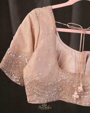 Brocade tissue georgette sarees with intricately embroidered border