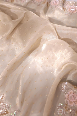 Brocade tissue georgette sarees with intricately embroidered border