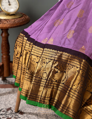 Lavender Gadwal Saree with a contrast coffee color border