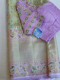 Stunning meenakari kanjeevaram in pastel green and lavender hues