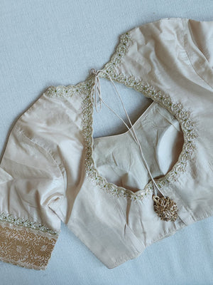 Banarasi tissue saree in a lovely sage green and ivory combo