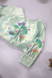 Muslin jamdaani in peach paired with a contrast mint green paithani blouse
