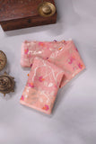 Muslin jamdaani in peach paired with a contrast mint green paithani blouse