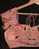 Soft organza saree in peach with a beautifully embroidered blouse