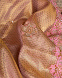 Gold kanjeevaram with contrast pink border and maggam work border