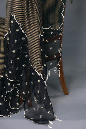 Elegant Tissue Organza saree in black and gold