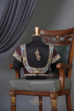 Timeless Ikkat patola elegance in rich chocolate brown
