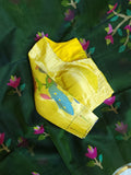 Bottle Green Jamdaani saree paired with a contrast yellow paithani blouse