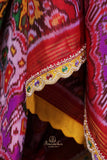 Patan Patola saree with intricately designed maggam work border