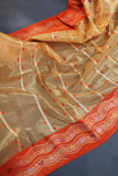 Banarasi Kora silk in a luxurious golden cream and orange border