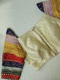 Off white brocade blouse with multi colored patch work sleeves