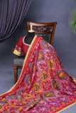 Patan Patola saree with intricately designed maggam work border