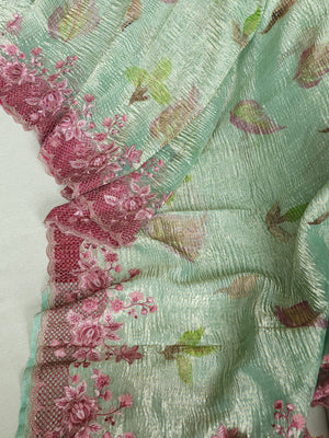 Crush tissue saree in aqua green with floral cutwork border