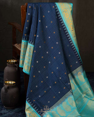 Timeless Gadwal Pattu saree in deep navy and teal blue