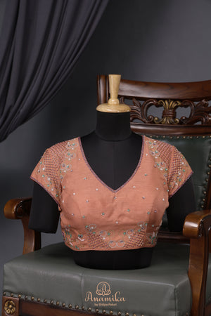 Crushed tissue saree in peach with beautiful cutwork border