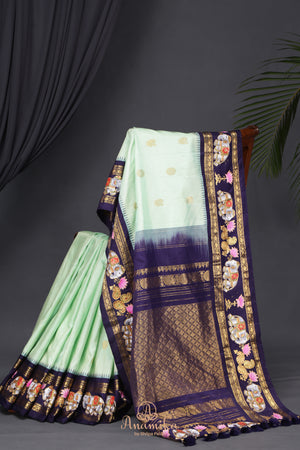 Gorgeous Gadwal with Stunning tanjore painting border