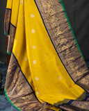 Gadwal Pattu saree in mustard yellow and navy blue