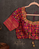 Brown kanjeevaram saree with a contrast dark pink border and Patola blouse