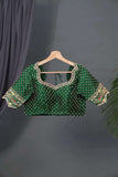 Dark green blouse with heavy embroidery work