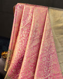 Stunning kanjeevaram in a dual tone peach pink color with meenakari border