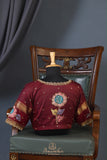 Peach and maroon kanjeevaram with floral applique border