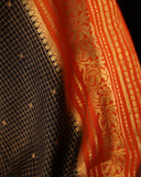 Mysore crepe silk saree in a lovely color combo of black and orange