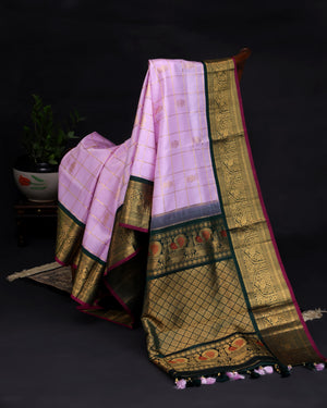 Gadwal kanchi saree in a beautiful lavender and emerald green combo