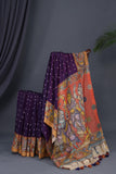 Deep purple bandini saree with a hand painted kalamkari border