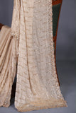 Stunning cocktail saree in champagne gold color
