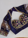 A purple Kota silk saree with beautiful floral prints