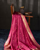 Raw mango pattu saree in a lovely shade of pink paired with a contrast floral blouse
