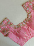 Multi colored pink hued Georgette saree with sequins border
