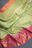 A dreamy kanjeevaram saree in a pastel green shade