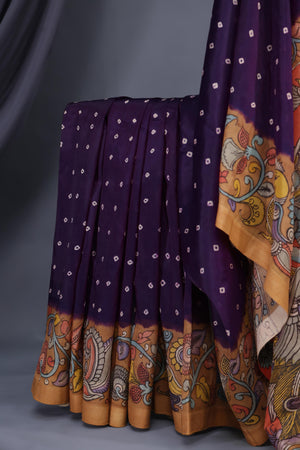 Deep purple bandini saree with a hand painted kalamkari border