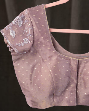 Brocade tissue georgette sarees with intricately embroidered border