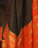 Mysore crepe silk saree in a lovely color combo of black and orange