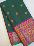 Peacock Green Gadwal Kanchi Saree with a magenta pink border